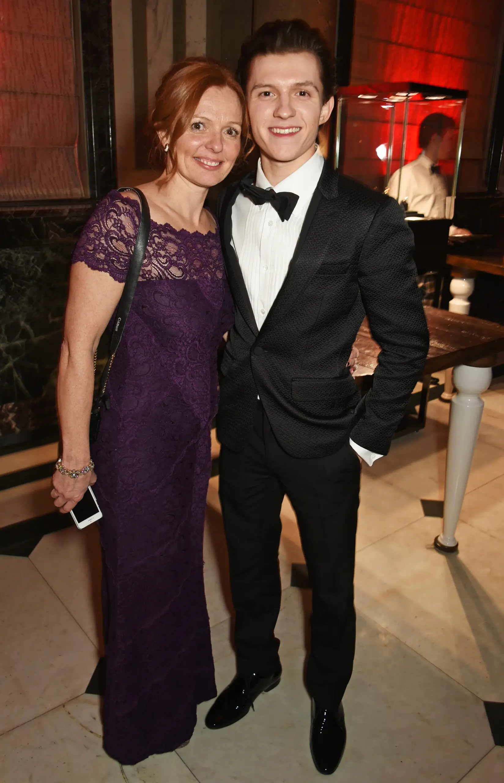 LONDON, ENGLAND – FEBRUARY 12: Tom Holland (R) and mother Nicola Elizabeth Frost attend The Weinstein Company, Entertainment Film Distributors, Studiocanal 2017 BAFTA After Party in partnership with Ben Sherman & Kat Florence at Rosewood London on February 12, 2017 in London, England. (Photo by David M. Benett/Dave Benett/Getty Images)
