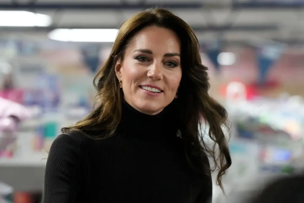 BARNET, ENGLAND – NOVEMBER 24: Catherine, Princess of Wales smiles during her visit to Sebby’s Corner on November 24, 2023 in Barnet, England. The Royal Foundation Centre for Early Childhood are to provide support to families with young children in the run up to Christmas. Sebby’s Corner was formed in January 2021 and provides items to families in need across Barnet, Hertfordshire and London. (Photo by Frank Augstein – WPA Pool/Getty Images)