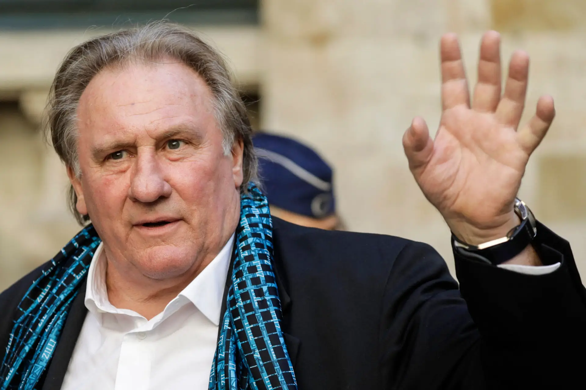 French actor Gerard Depardieu waves as he arrives at the Town Hall in Brussels for a ceremony as part of the ‘Brussels International Film Festival’ (Briff) on June 25, 2018. (Photo by THIERRY ROGE / BELGA / AFP) / Belgium OUT (Photo by THIERRY ROGE/BELGA/AFP via Getty Images)