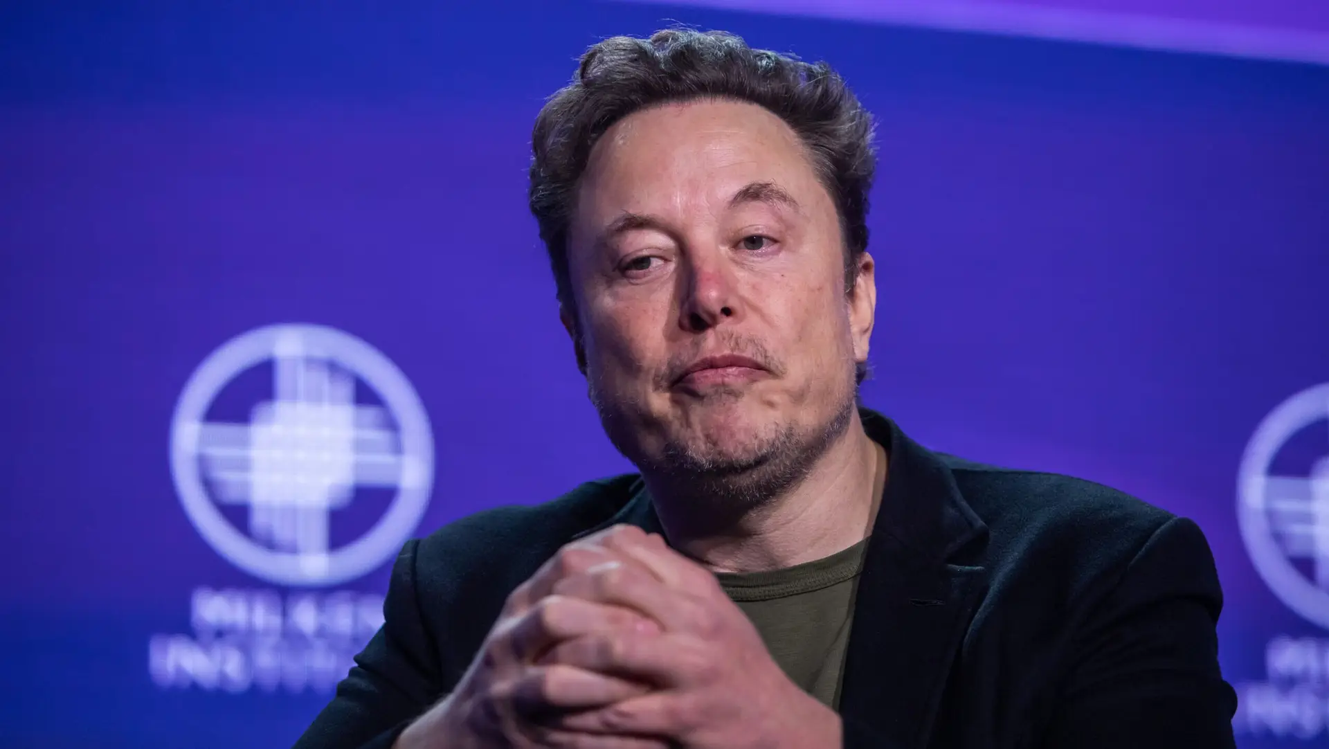 BEVERLY HILLS, CALIFORNIA – MAY 6: Elon Musk, co-founder of Tesla and SpaceX and owner of X Holdings Corp., speaks at the Milken Institute’s Global Conference at the Beverly Hilton Hotel,on May 6, 2024 in Beverly Hills, California. The 27th annual global conference explores various topics, from the rise of generative AI to electric vehicle trends and features participants, soccer star David Beckham and actor Ashton Kutcher. (Photo by Apu Gomes/Getty Images)