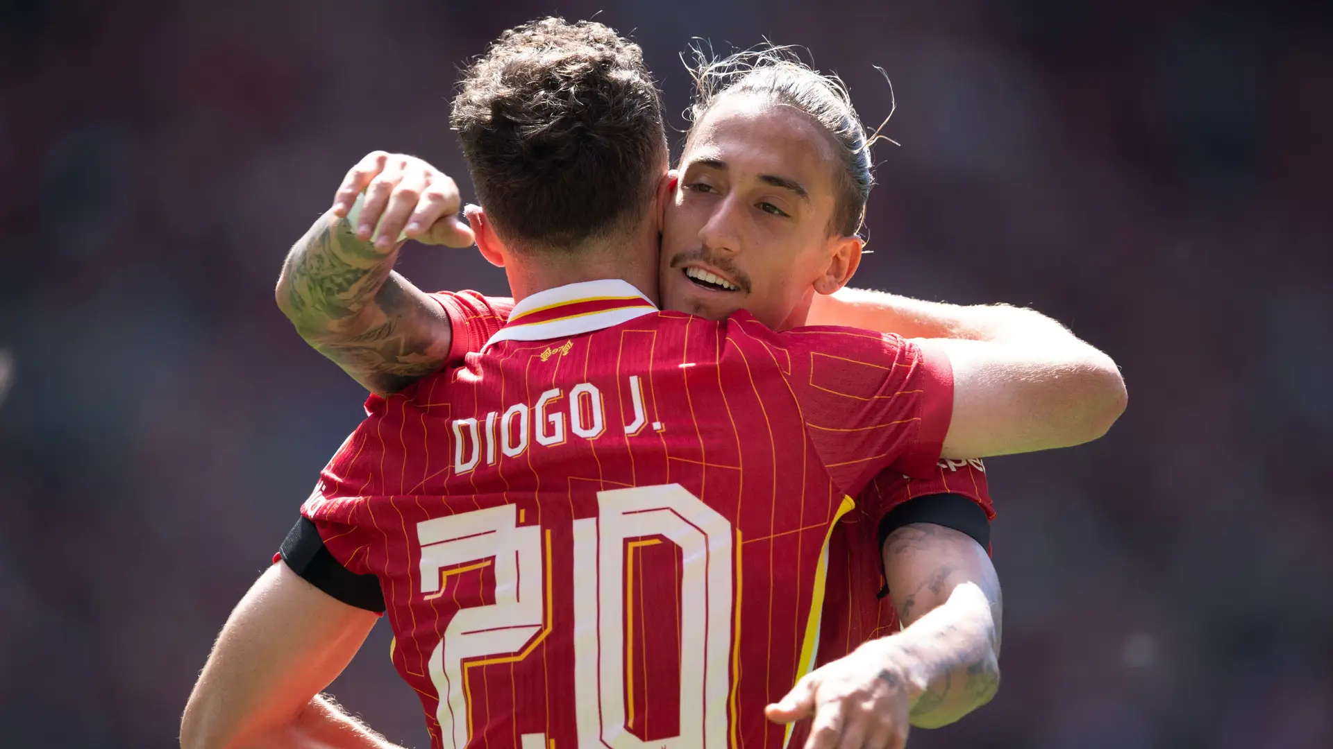 Diogo Jota e Kostas Tsimikas