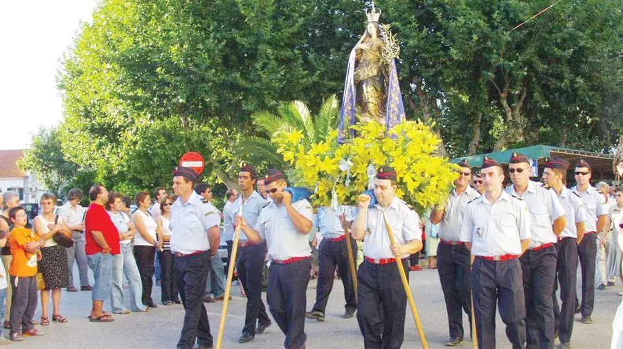 Os pagadores de promessas e os transportadores dos andores