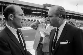 Stirling Moss com Juan Manuel Fangio
