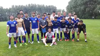 Rodrigo (4º atrás a partir da direita) com a equipa chinesa Cangzhou Mighty Lions Football Club 