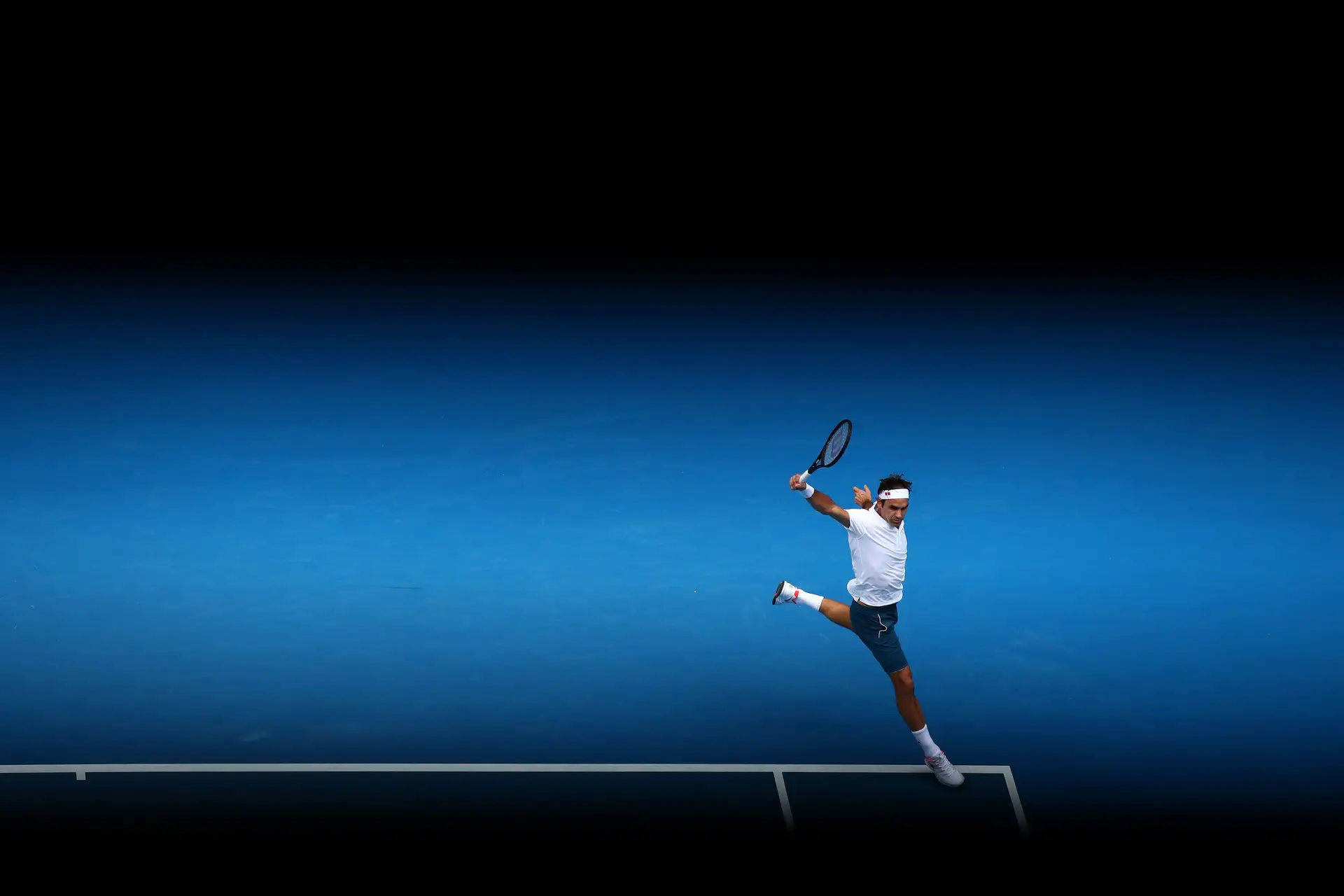 A perfeita pancada de esquerda a uma mão de Roger Federer, agora em vias de extinção