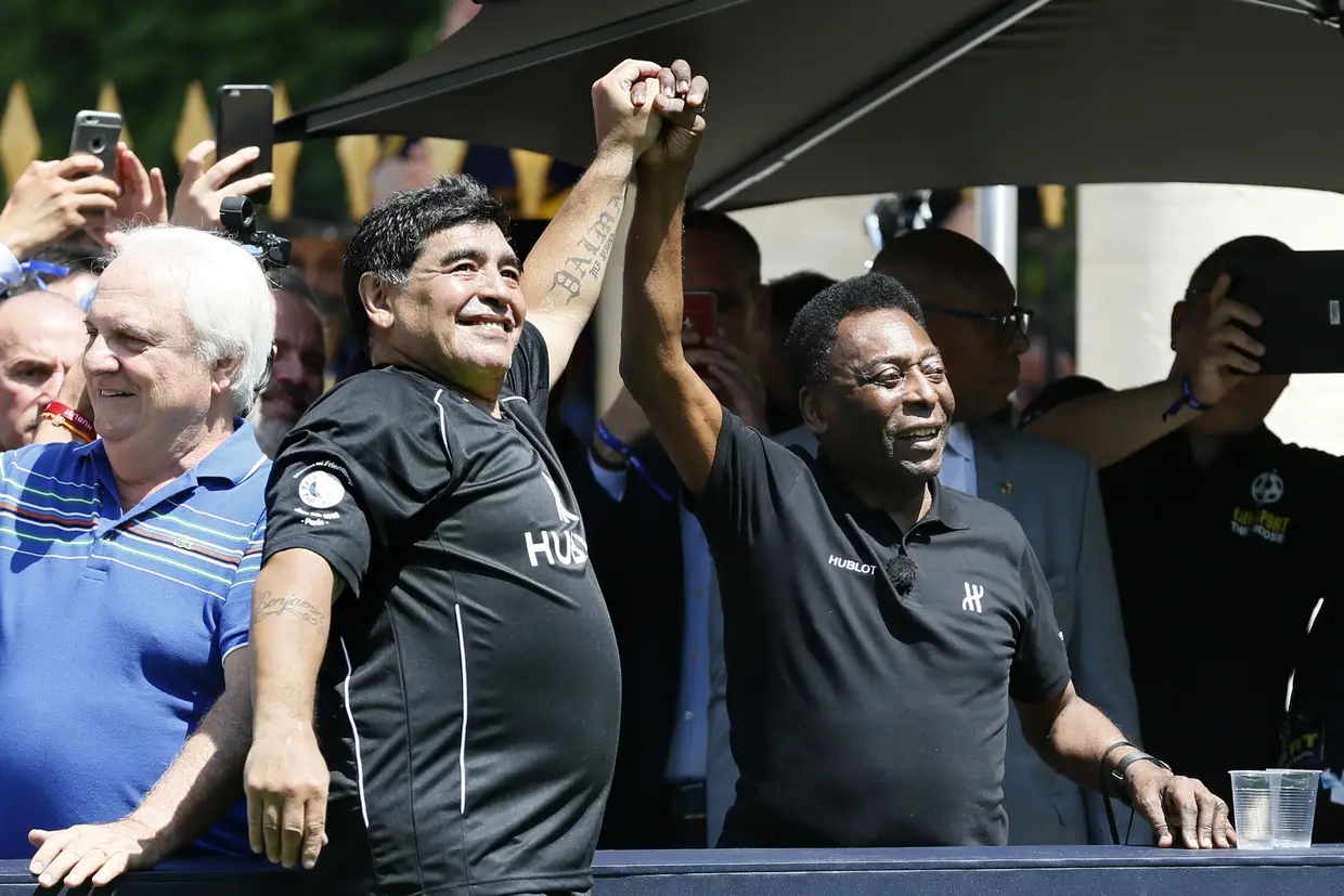 Com Maradona, num evento em 2016