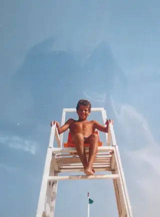 Ainda em criança na praia