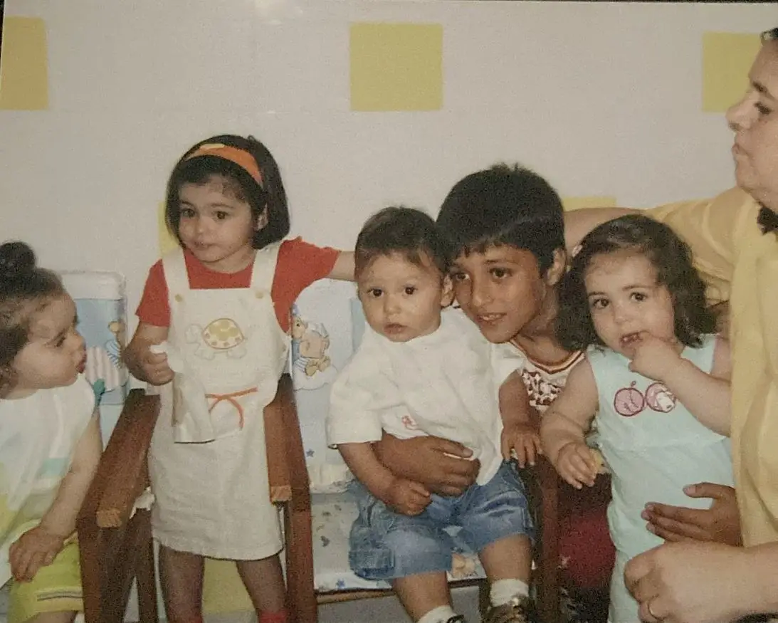 Rui Pedro com o irmão ao colo