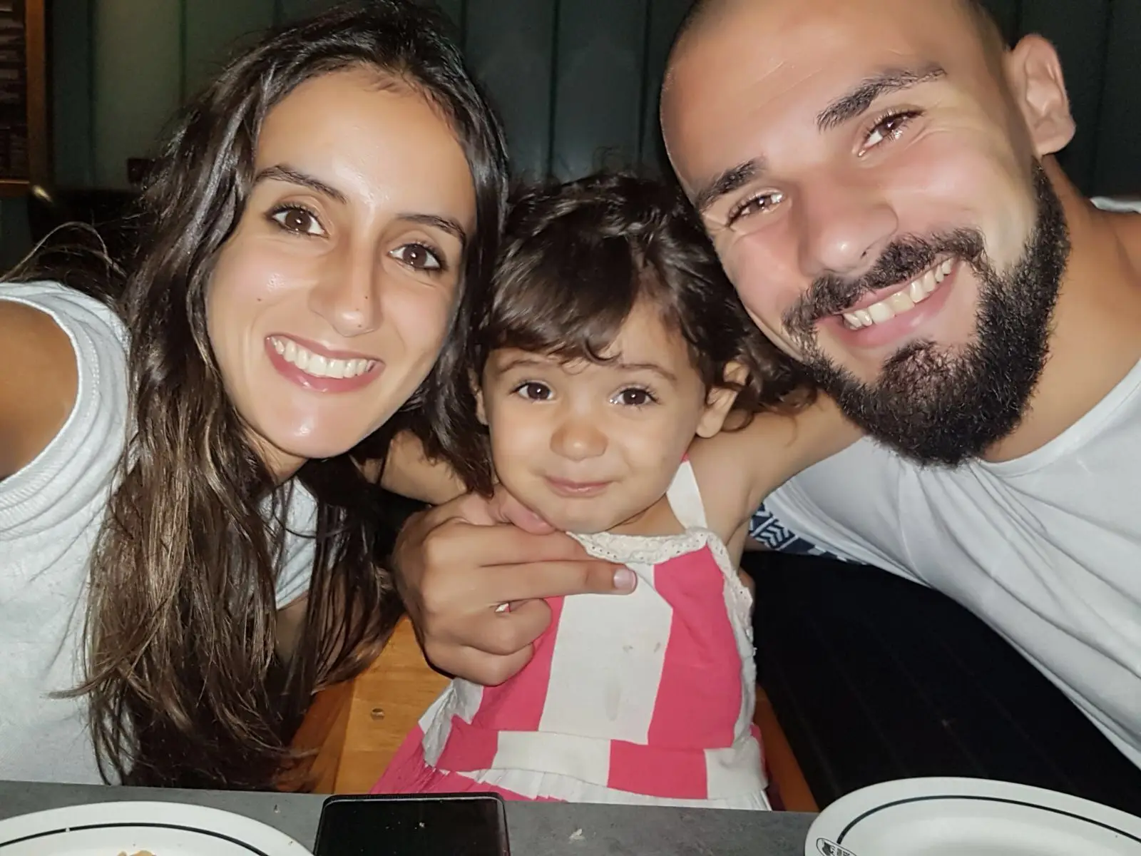 Leandro com a primeria filha, Carolina, e a mulher Sara