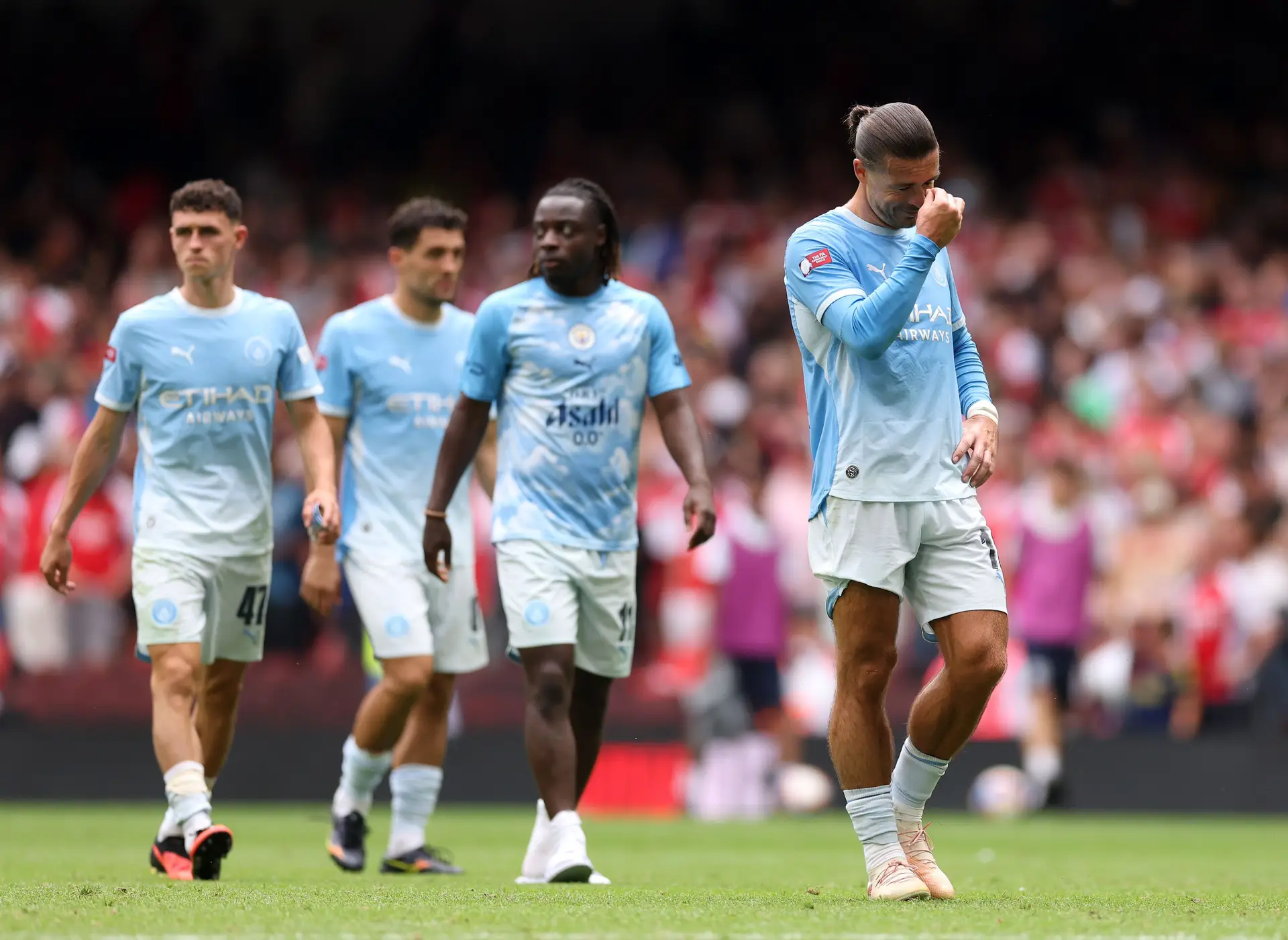 Jogadores do City reagem à derrota clara frente ao Arsenal no primeiro jogo oficial da época