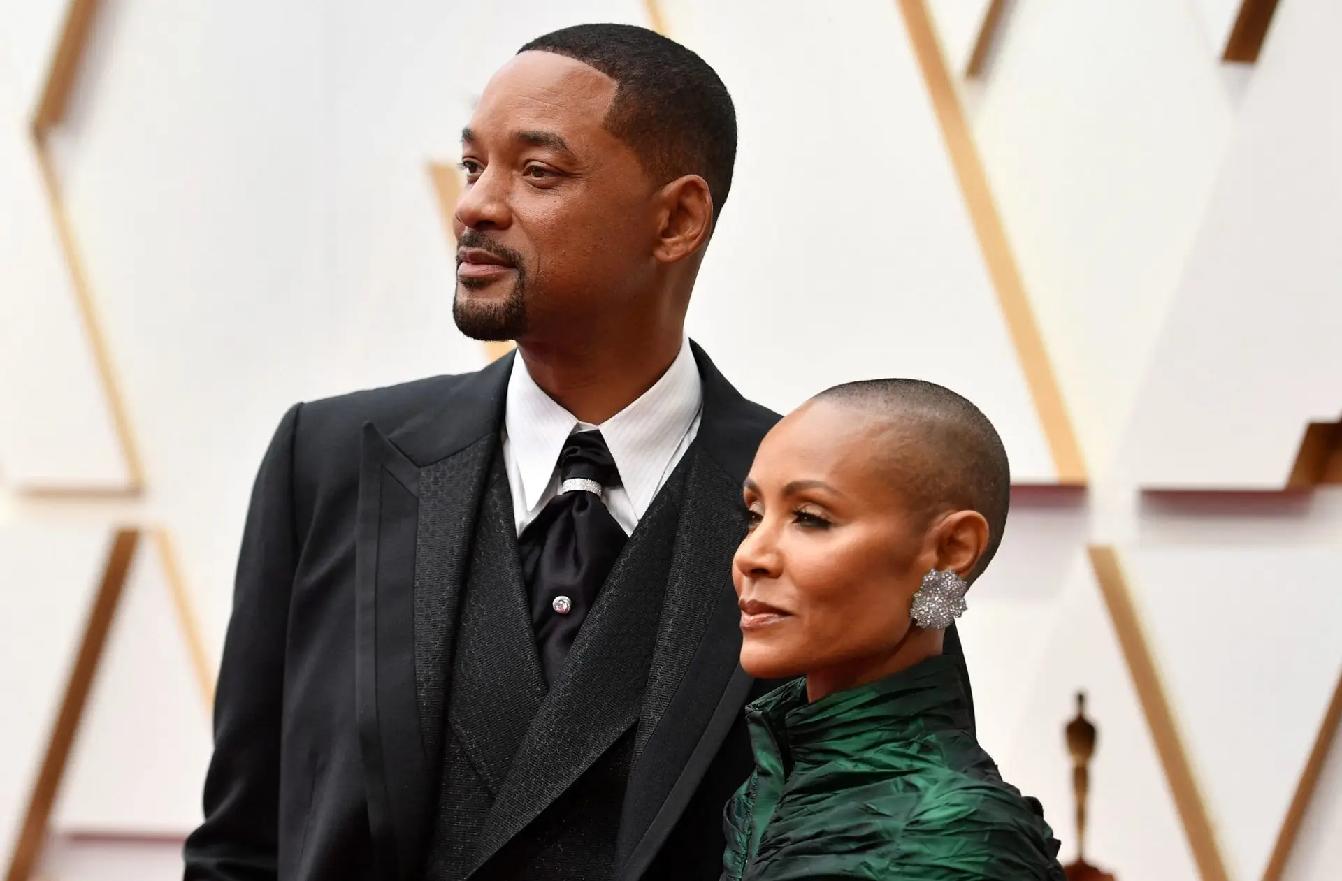 US actor Will Smith(L) and Jada Pinkett Smith attend the 94th Oscars at the Dolby Theatre in Hollywood, California on March 27, 2022. (Photo by Angela WEISS / AFP) / The erroneous mention[s] appearing in the metadata of this photo by Angela WEISS has been modified in AFP systems in the following manner: [Jada Pinkett Smith] instead of [Jada Pink Smith]. Please immediately remove the erroneous mention[s] from all your online services and delete it (them) from your servers. If you have been authorized by AFP to distribute it (them) to third parties, please ensure that the same actions are carried out by them. Failure to promptly comply with these instructions will entail liability on your part for any continued or post notification usage. Therefore we thank you very much for all your attention and prompt action. We are sorry for the inconvenience this notification may cause and remain at your disposal for any further information you may require. (Photo by ANGELA WEISS/AFP via Getty Images)