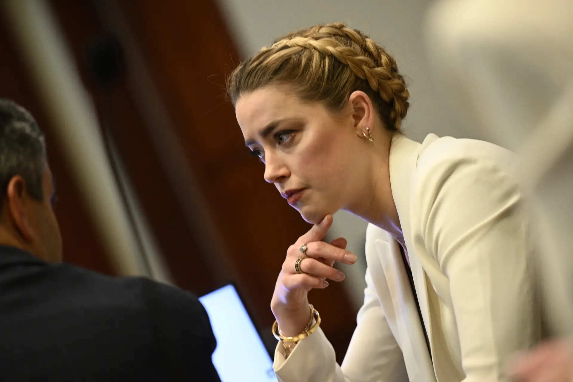 Actress Amber Heard arrives at the courtroom for the defamation trial against her at the Fairfax County Circuit Courthouse in Fairfax, Virginia, April 26, 2022. – Actor Johnny Depp sued ex-wife Heard for libel after she wrote an op-ed piece in The Washington Post in 2018 referring to herself as a public figure representing domestic abuse. (Photo by Brendan SMIALOWSKI / POOL / AFP) (Photo by BRENDAN SMIALOWSKI/POOL/AFP via Getty Images)