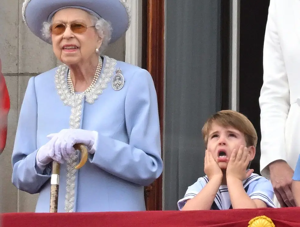 LONDON, ENGLAND – JUNE 02: (L-R) Queen Elizabeth II and Prince Louis during Trooping the Colour on June 02, 2022 in London, England. The Platinum Jubilee of Elizabeth II is being celebrated from June 2 to June 5, 2022, in the UK and Commonwealth to mark the 70th anniversary of the accession of Queen Elizabeth II on 6 February 1952. Trooping The Colour, also known as The Queen’s Birthday Parade, is a military ceremony performed by regiments of the British Army that has taken place since the mid-17th century. It marks the official birthday of the British Sovereign. This year, from June 2 to June 5, 2022, there is the added celebration of the Platinum Jubilee of Elizabeth II in the UK and Commonwealth to mark the 70th anniversary of her accession to the throne on 6 February 1952. (Photo by Karwai Tang/WireImage)