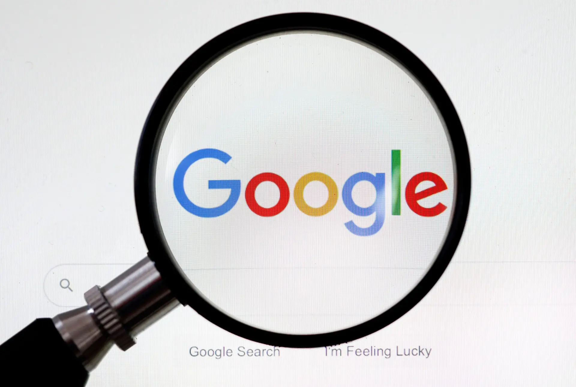 PARIS, FRANCE – SEPTEMBER 10: In this photo illustration, the Google logo is displayed through a magnifying glass on the screen of a computer on September 10, 2019 in Paris, France. Yesterday in Washington, DC, fifty state attorneys general are joining together announced the launch of an antitrust investigation against the Google company, accused of dominating all aspects of advertising and Internet search. (Photo by Chesnot/Getty Images)