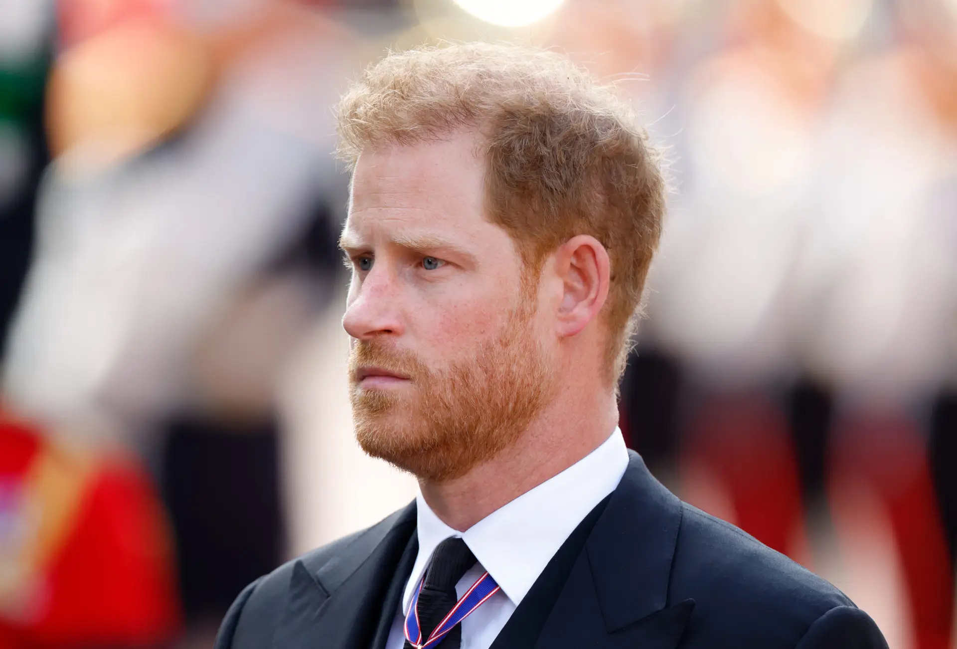 LONDON, UNITED KINGDOM – SEPTEMBER 14: (EMBARGOED FOR PUBLICATION IN UK NEWSPAPERS UNTIL 24 HOURS AFTER CREATE DATE AND TIME) Prince Harry, Duke of Sussex walks behind Queen Elizabeth II’s coffin as it is transported on a gun carriage from Buckingham Palace to The Palace of Westminster ahead of her Lying-in-State on September 14, 2022 in London, United Kingdom. Queen Elizabeth II’s coffin is taken in procession on a Gun Carriage of The King’s Troop Royal Horse Artillery from Buckingham Palace to Westminster Hall where she will lay in state until the early morning of her funeral. Queen Elizabeth II died at Balmoral Castle in Scotland on September 8, 2022, and is succeeded by her eldest son, King Charles III. (Photo by Max Mumby/Indigo/Getty Images)