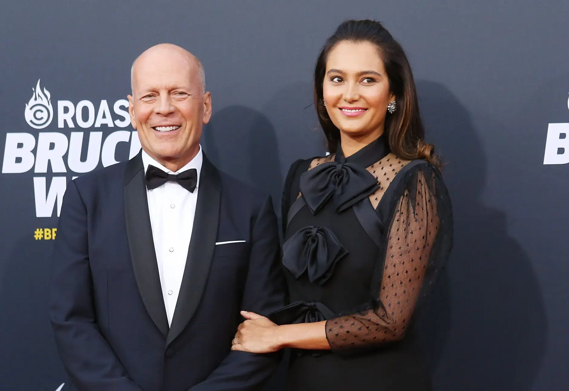 LOS ANGELES, CA – JULY 14: Bruce Willis and Emma Heming arrive to the Comedy Central “Roast of Bruce Willis” held on July 14, 2018 in Los Angeles, California. (Photo by Michael Tran/FilmMagic)