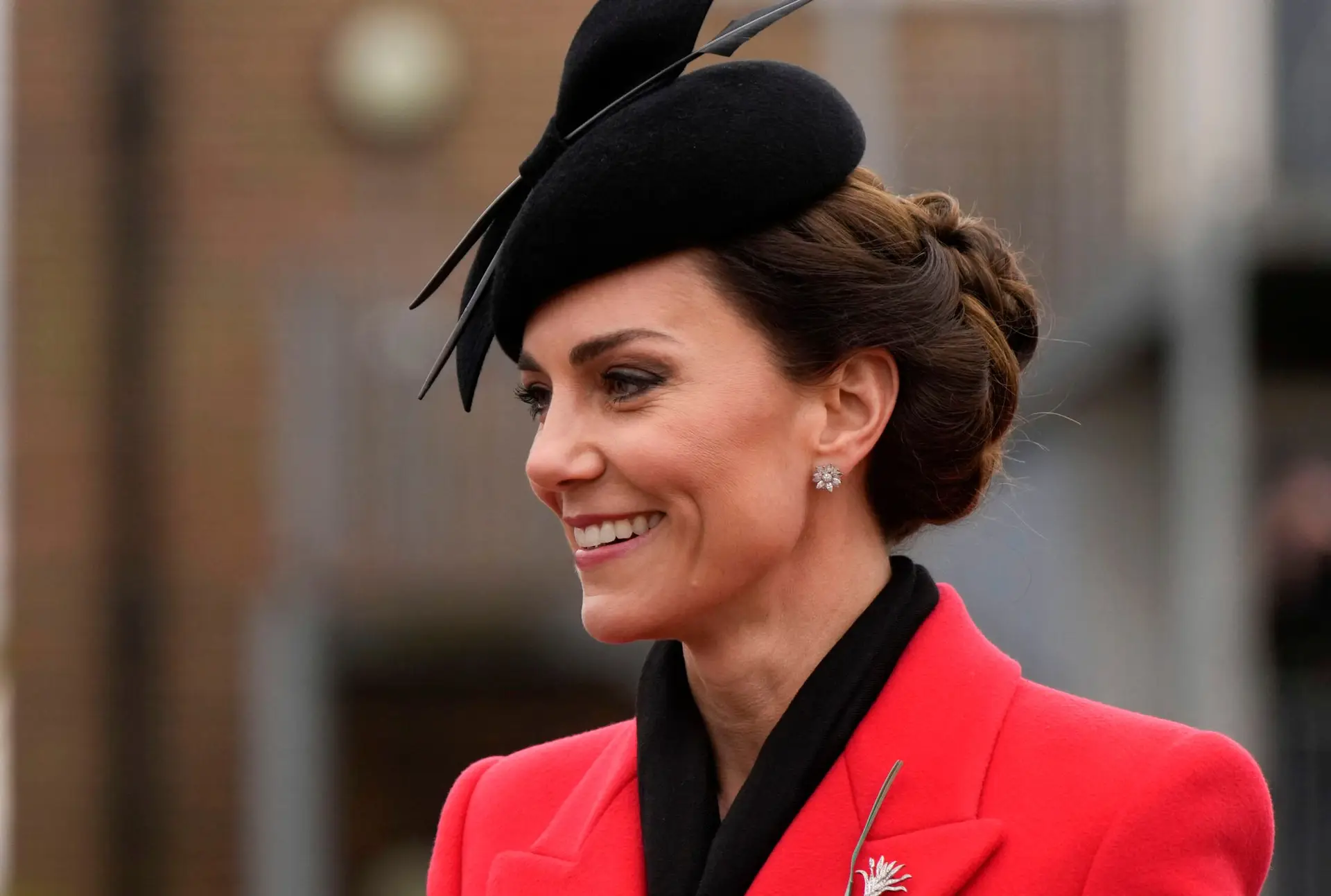 WINDSOR, ENGLAND – MARCH 01: Catherine, Princess of Wales smiles during a visit to the 1st Battalion Welsh Guards at Combermere Barracks for the St David’s Day Parade on March 1, 2023 in Windsor, England. (Photo by Alastair Grant – WPA Pool/Getty Images)