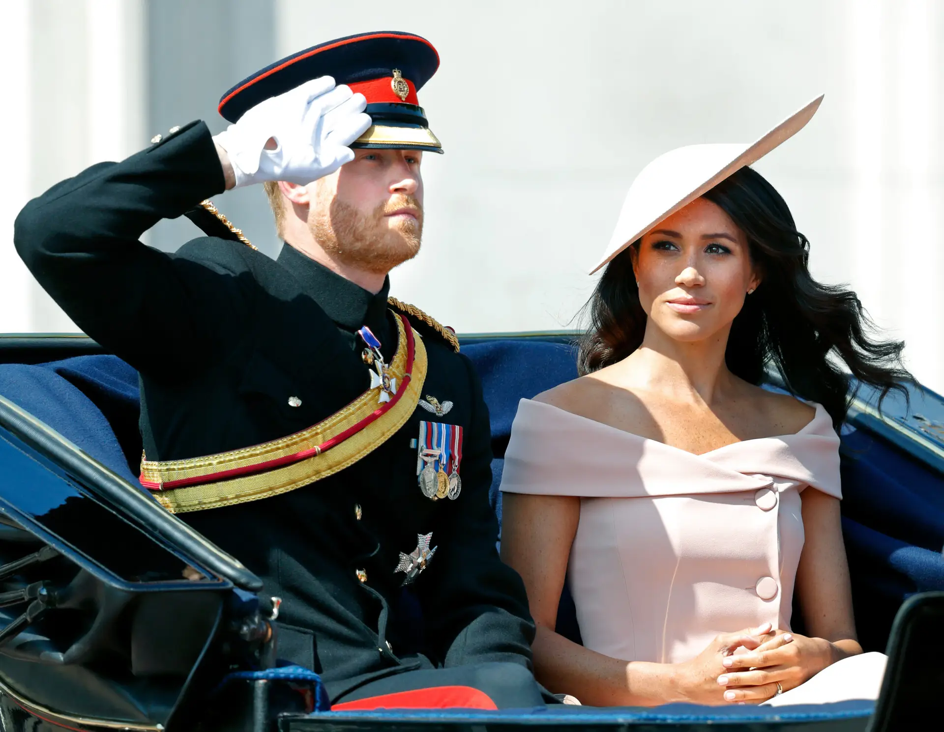 LONDON, UNITED KINGDOM – JUNE 09: (EMBARGOED FOR PUBLICATION IN UK NEWSPAPERS UNTIL 24 HOURS AFTER CREATE DATE AND TIME) Prince Harry, Duke of Sussex and Meghan, Duchess of Sussex travel down The Mall in a horse drawn carriage during Trooping The Colour 2018 on June 9, 2018 in London, England. The annual ceremony, involving over 1400 guardsmen and cavalry, is believed to have first been performed during the reign of King Charles II. The parade marks the official birthday of the Sovereign, even though the Queen’s actual birthday is on April 21st. (Photo by Max Mumby/Indigo/Getty Images)