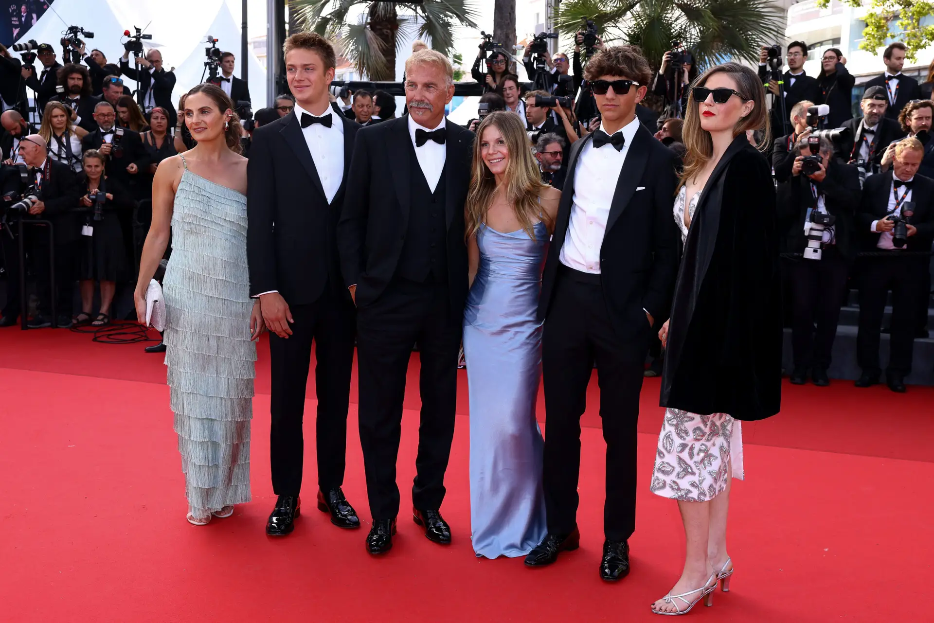 CANNES, FRANCE – MAY 19: Annie Costner, Cayden Wyatt Costner, Kevin Costner, Grace Avery Costner, Hayes Logan Costner and Lily Costner attend the “Horizon: An American Saga” Red Carpet at the 77th annual Cannes Film Festival at Palais des Festivals on May 19, 2024 in Cannes, France. (Photo by Marc Piasecki/FilmMagic)