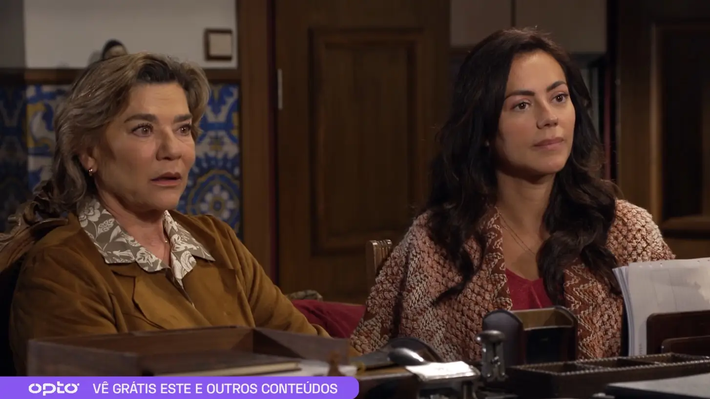 Flávia ouviu Joana chamar Judite de mãe.