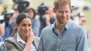 Meghan Markle esconde novas formas com estilo masculino