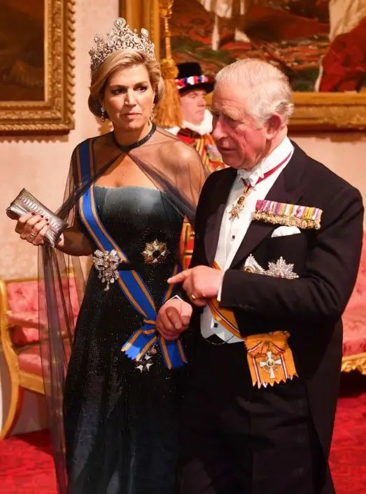 Máxima da Holanda com o príncipe Carlos de Inglaterra