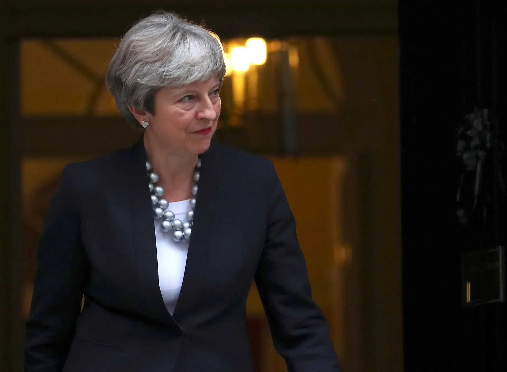 Theresa May defende medidas de austeridade e economia de mercado