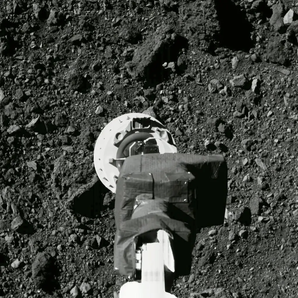 Sonda OSIRIS-REx aterra em asteroide Bennu para recolher amostra