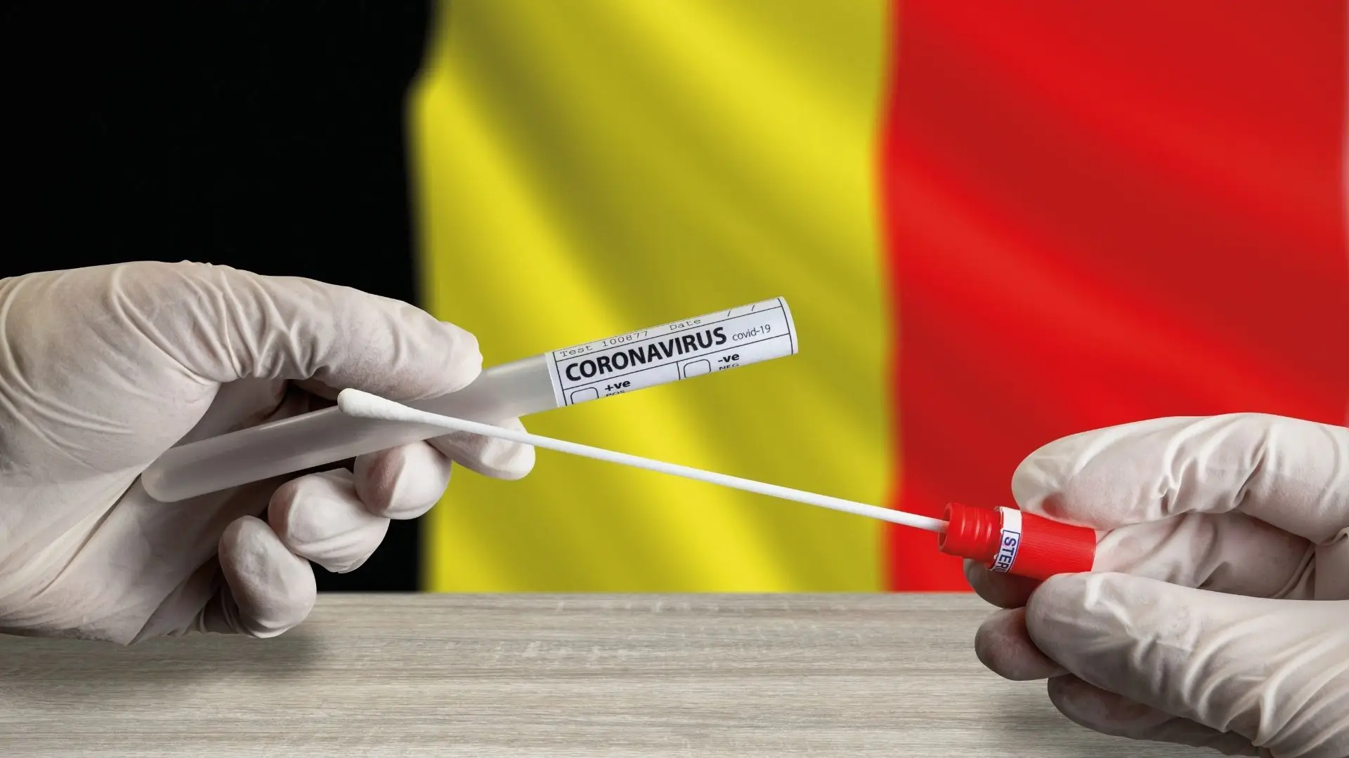 Bandeira da Bélgica e uma zaragatoa