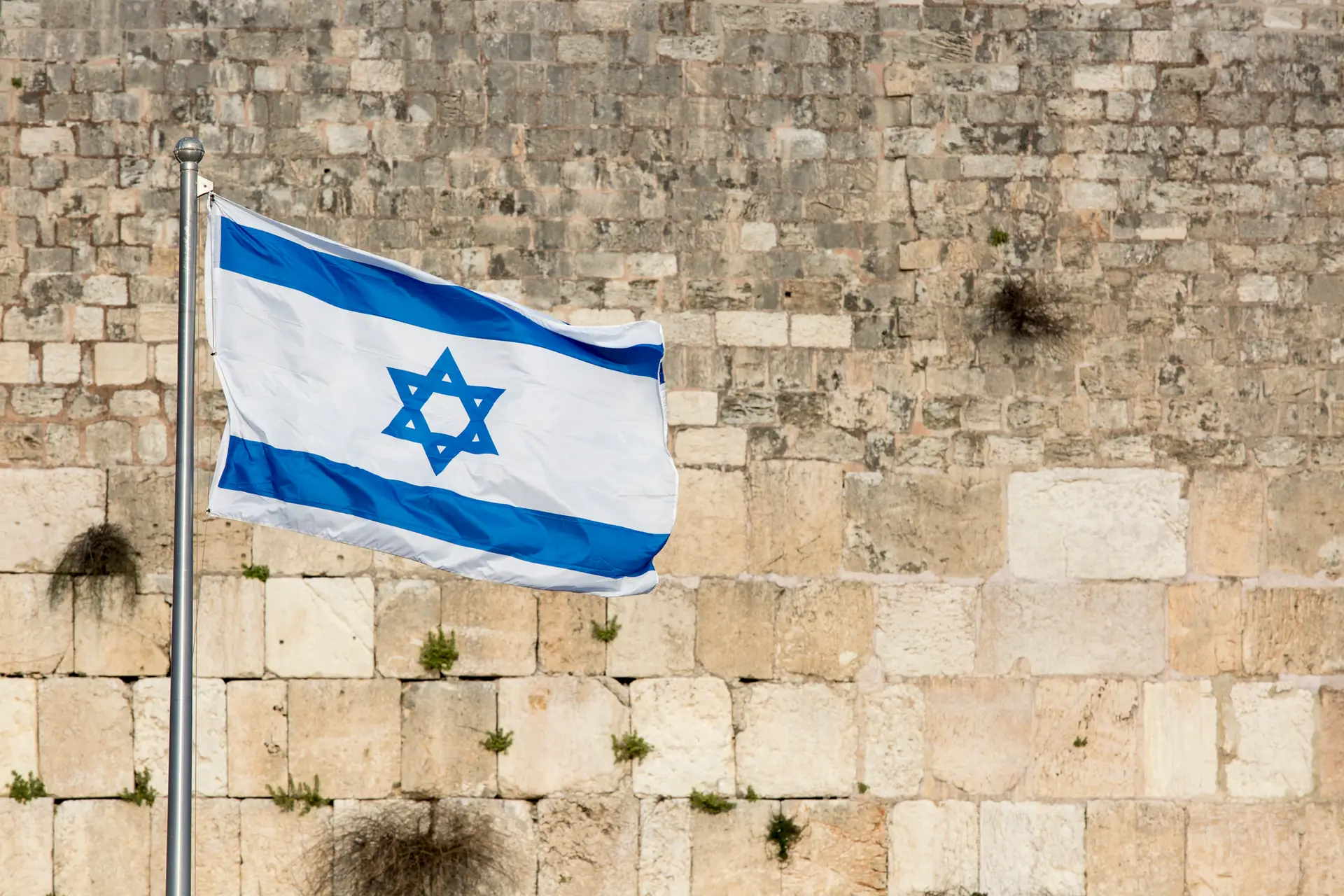 Israel, Jerusalem, Israeli Flag flies over Western Wall