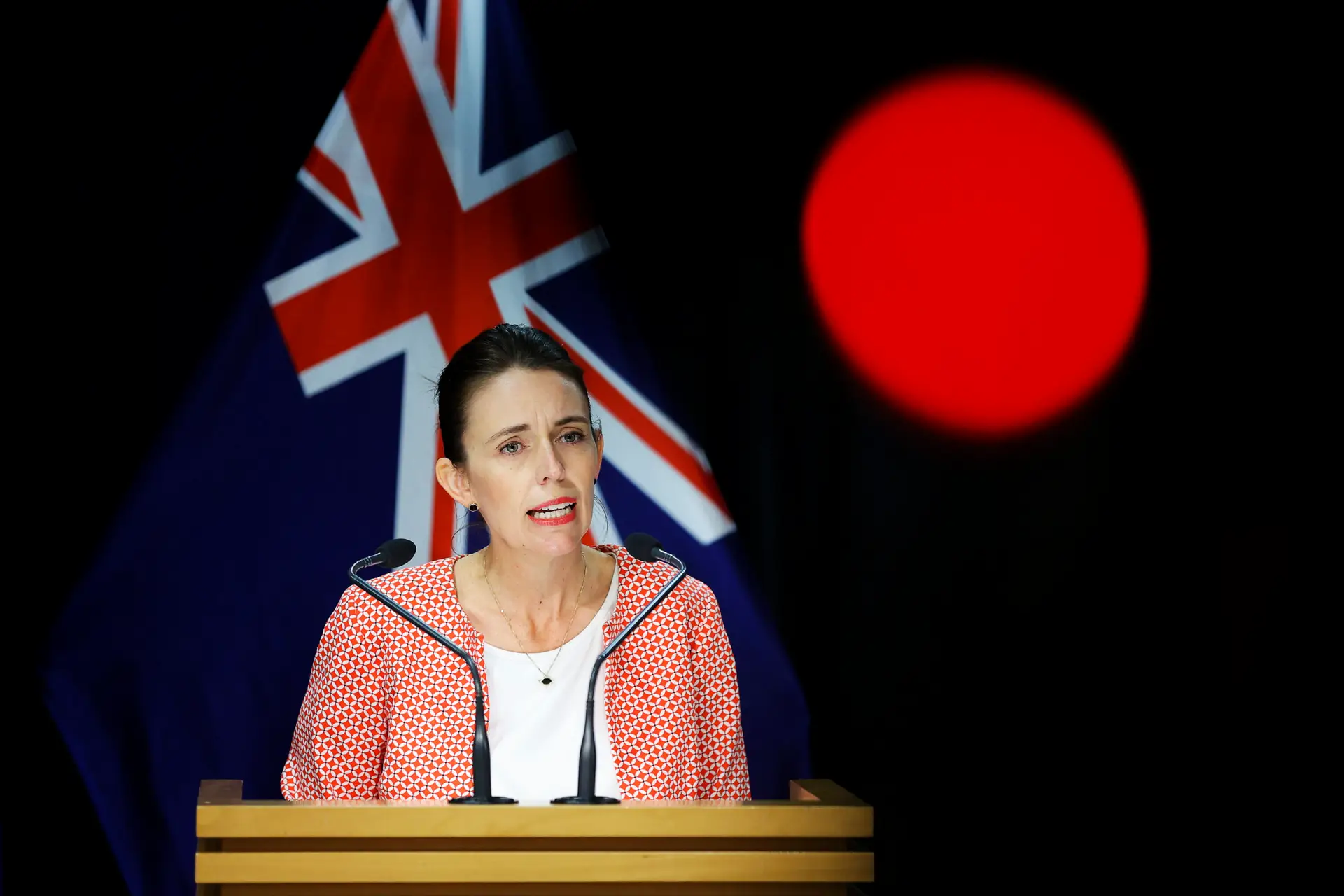 WELLINGTON, NEW ZEALAND – JANUARY 23: Prime Minister Jacinda Ardern speaks during a press conference at Parliament on January 23, 2022 in Wellington, New Zealand. Prime Minister Jacinda Ardern announced that New Zealand will be moving to the red traffic light setting at 11.59pm tonight after nine cases reported in Nelson/ Marlborough region were discovered to have the Omicron variant. (Photo by Hagen Hopkins/Getty Images)