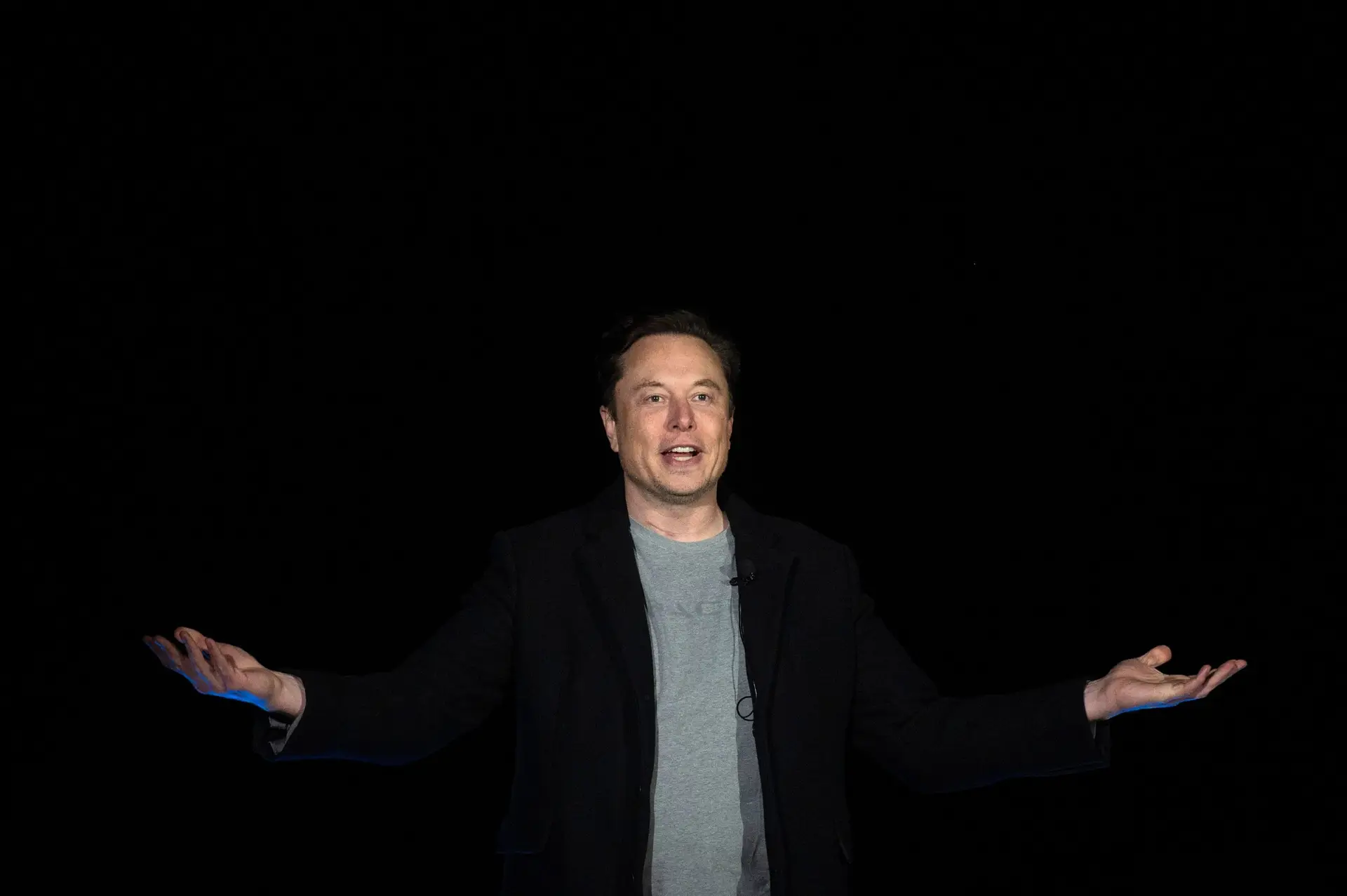 Elon Musk gestures as he speaks during a press conference at SpaceX’s Starbase facility near Boca Chica Village in South Texas on February 10, 2022. – Billionaire entrepreneur Elon Musk delivered an eagerly-awaited update on SpaceX’s Starship, a prototype rocket the company is developing for crewed interplanetary exploration. (Photo by JIM WATSON / AFP) (Photo by JIM WATSON/AFP via Getty Images)