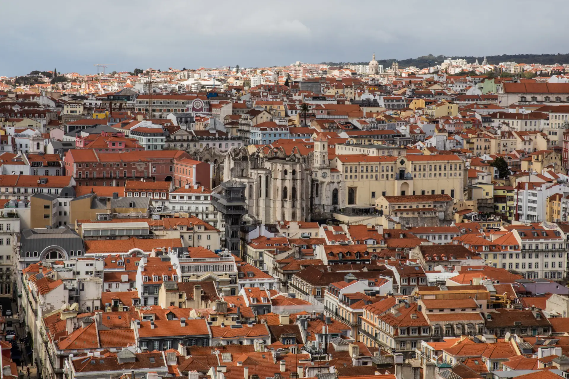 A view of the Igreja do Carmo (C) from the Castelo de S. Jorge (São Jorge Castle) in Lisbon, Portugal, on March 31, 2022. São Jorge Castle is a historic castle in the Portuguese capital of Lisbon, located in the freguesia of Santa Maria Maior. (Photo by Manuel Romano/NurPhoto via Getty Images)