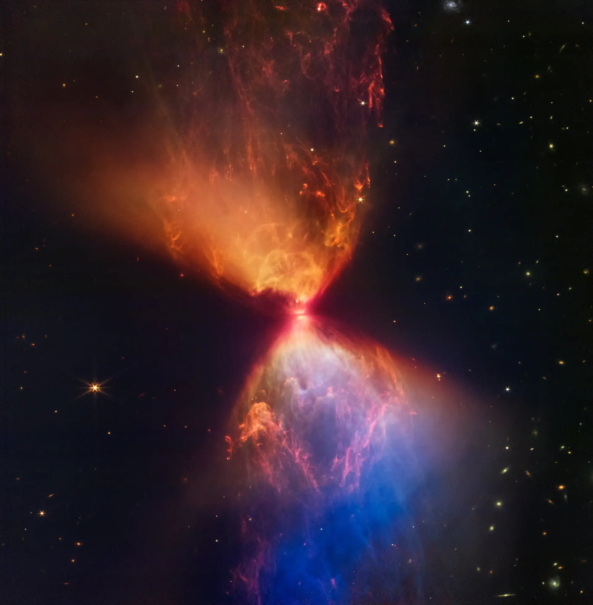 A ampulheta colorida que mostra o nascimento de uma estrela