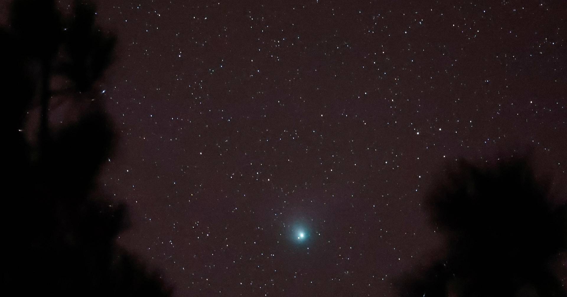 The “green comet” passes Earth before disappearing into the outer reaches of the solar system