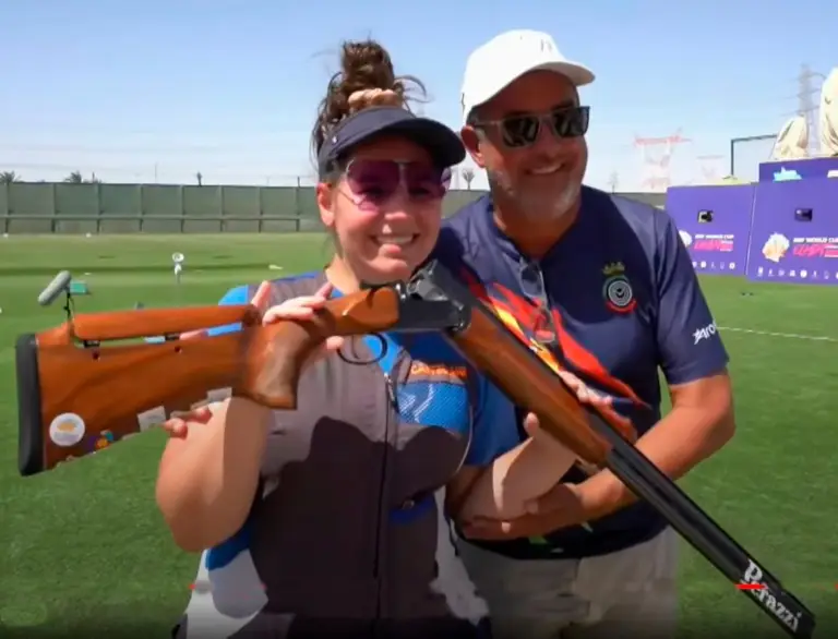 Maria Inês Barros medalha de Ouro e o seu treinador Custódio Ezequiel