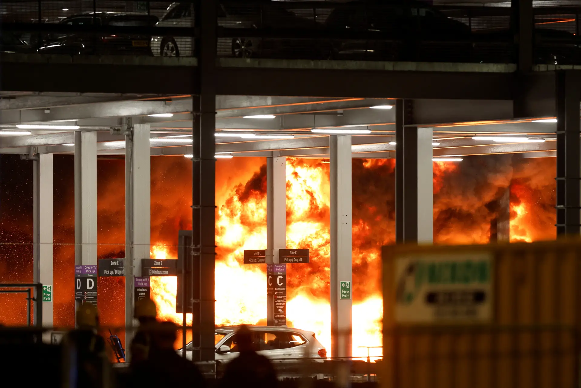 A fire in a car park at Luton Airport in London, England