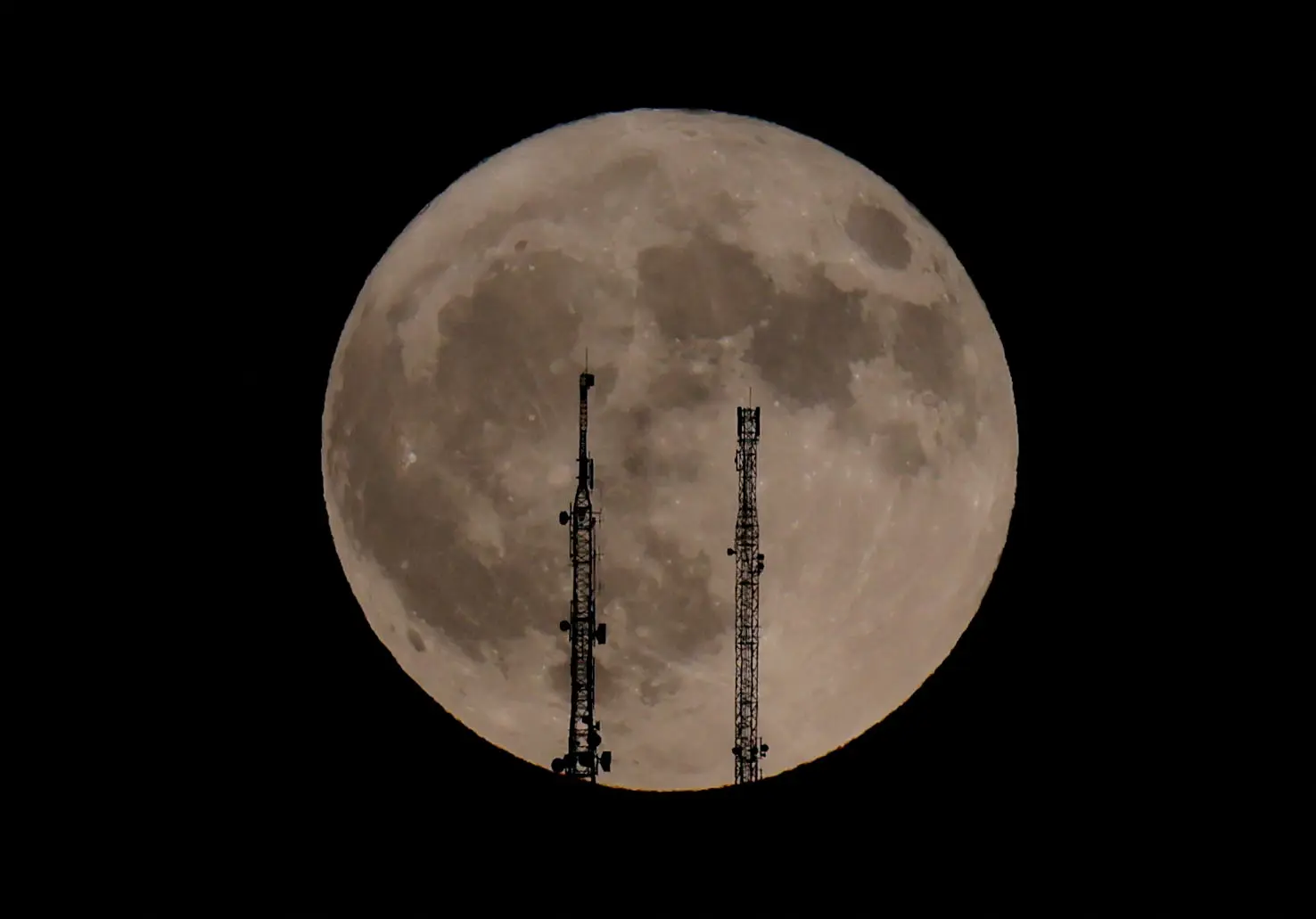 Stunning Images of the First Supermoon of 2024 Illuminate Lisbon and Ronda